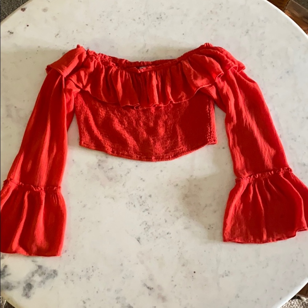 Cropped red ruffled top